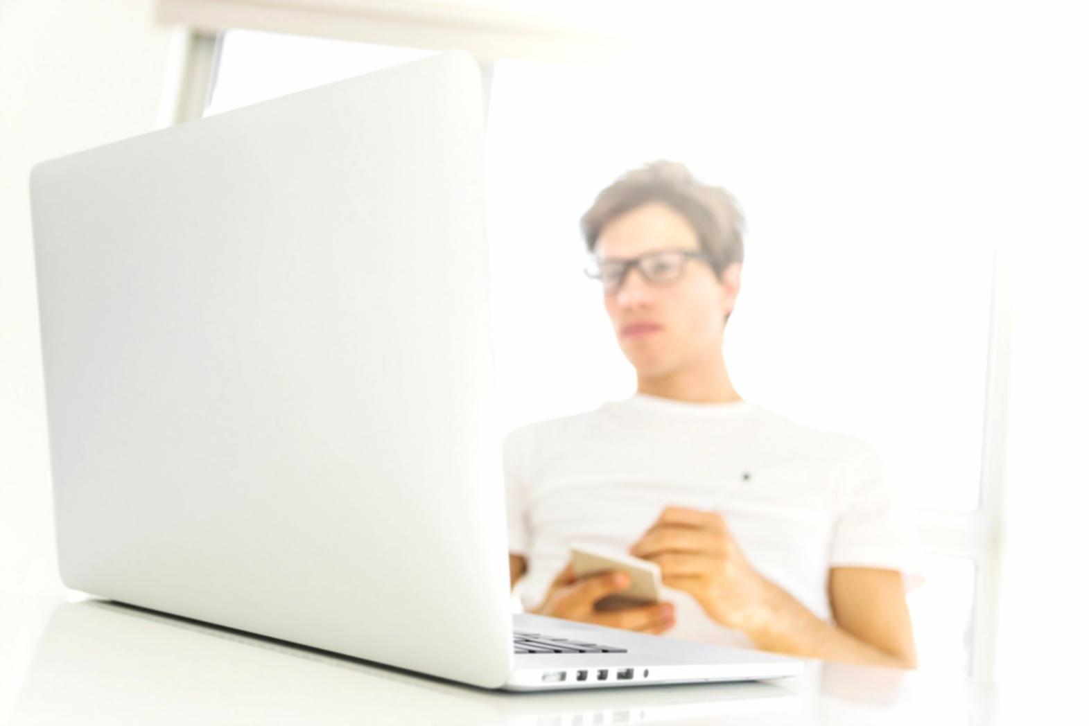 Team collaboration reviewing client portfolio performance and market analysis